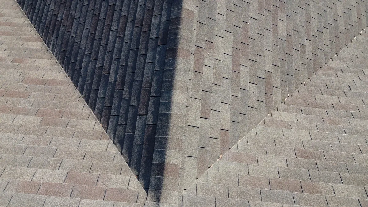 Difficult roof access requiring specialized staging and safety equipment