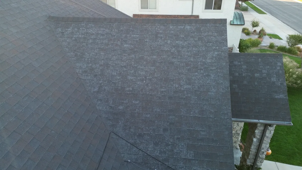 Standard architectural asphalt shingles being installed on a Salt Lake City home