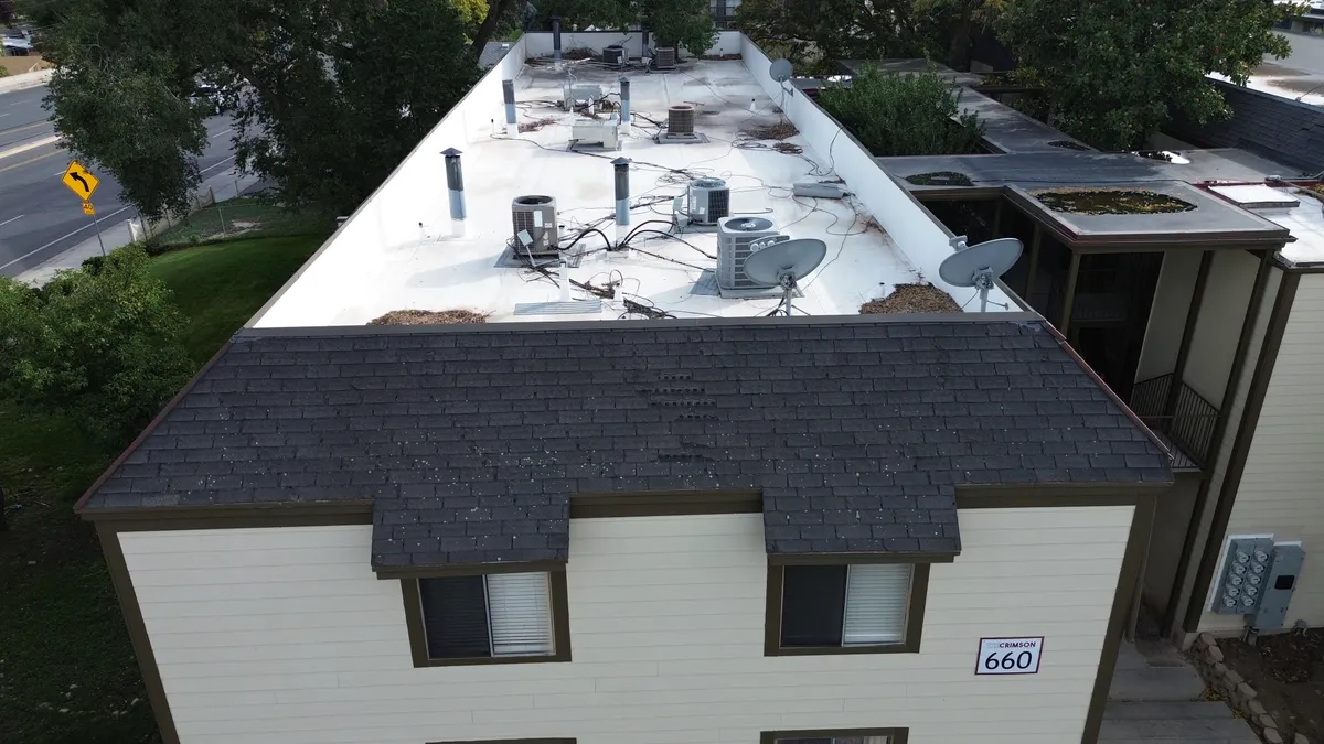 Installation of Class 4 impact-resistant shingles designed for Utah storm protection