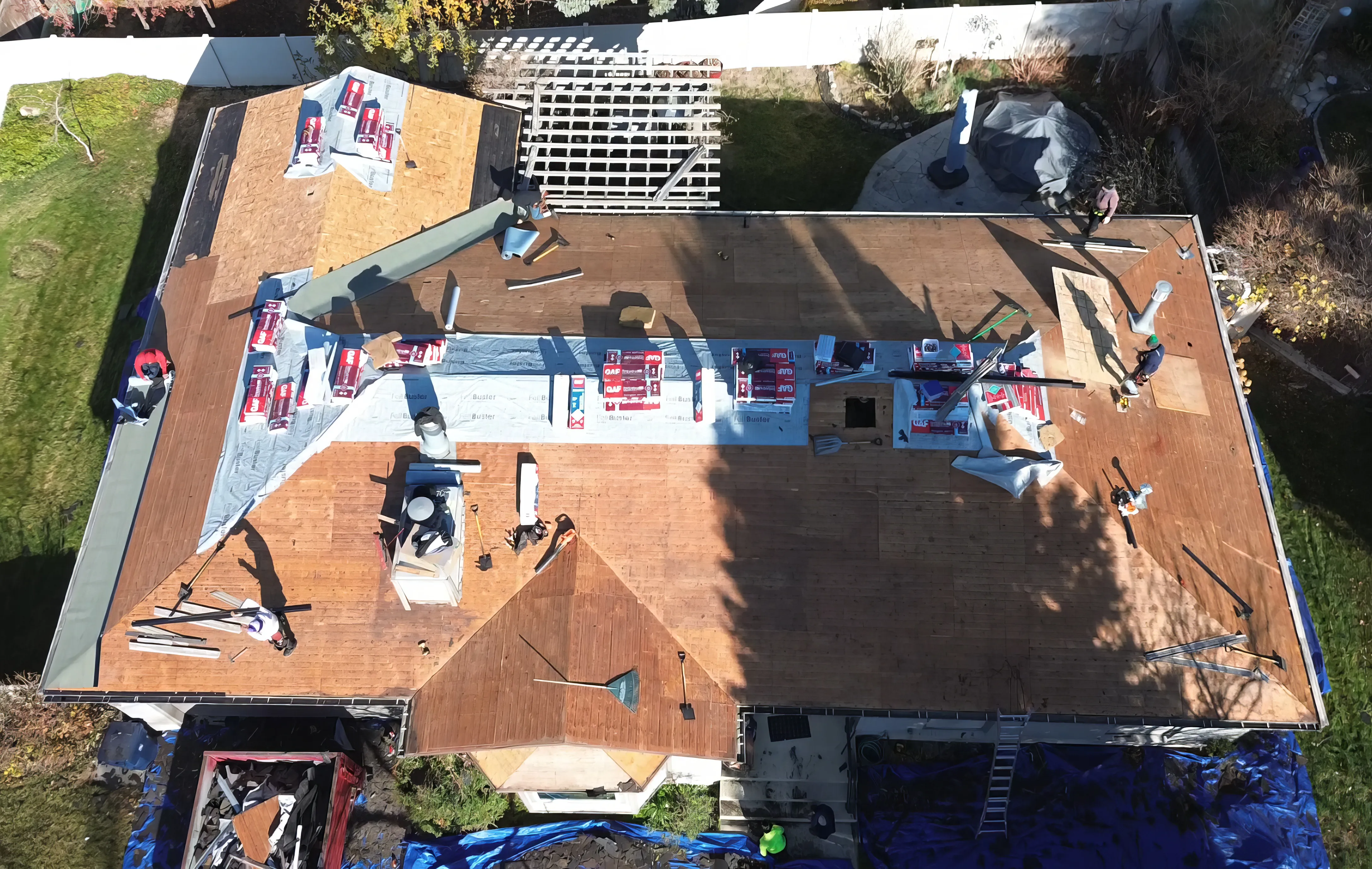 Professional roof installation following building permits and standards